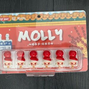 Red and White Toy Figures Set